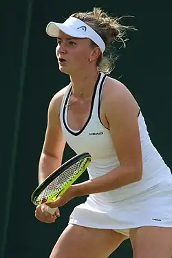 Barbora Krejčíková, the ladies' singles champion. It was her second major title.[2]