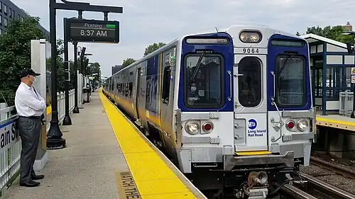 A Port Washington Branch train enters the station