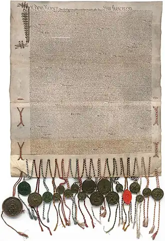 Exemplaire du traité de « paix perpétuelle » de 1516 conservé aux Archives de l'État de Fribourg.