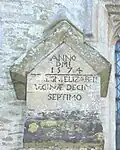 Inscription dating the buttresses to 1574