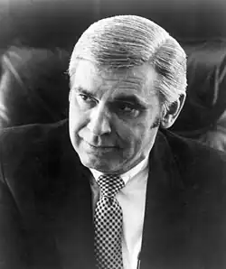 Leo Ryan, a middle-aged man wearing a suit and tie.