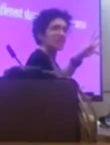 Headshot of Diamond gesturing during a lecture