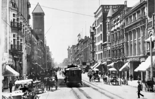 Looking south along Broadway from First, 1904-5. At right, from left to right: C.H. Frost Building, 141-3, the turreted Roanoke Bldg, Newell & Gammon Bldg., Mason Opera House. At left, Chamber of Commerce, 1888 City Hall.