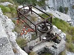 Machinery of the quarrymen near a shelter on the line