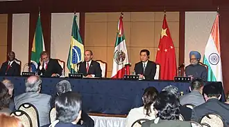 President Felipe Calderón and President Hu Jintao (along with other leaders) speaking during the G-8 Summit at Sapporo, Japan; July 2008.