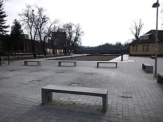 Sand filled trapezoidal lock viewed from the street