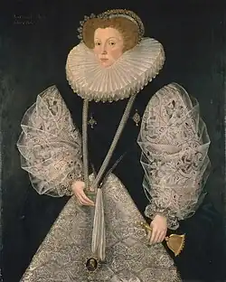 Blackwork sleeves with large free-stitched flowers filled with geometric patterns, under sheer linen oversleeves, and a counted blackwork forepart under her skirt. Portrait of Mary Cornwallis by George Gower, c. 1580.