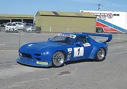Bruce Banks placed seventh driving a Mazda RX-7