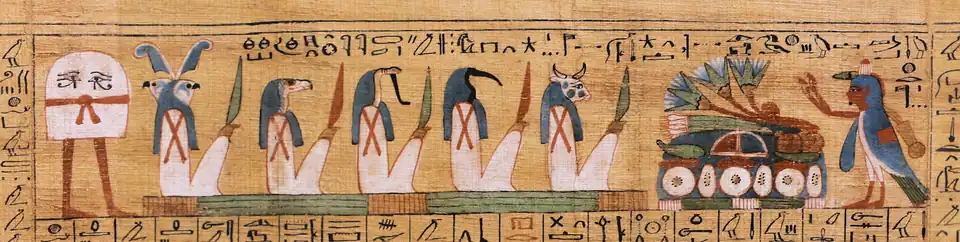 A vignette from a larger papyrus scroll. On the far right is Medjed, who appears as an oculated dome-like figure, supported by two human-like feet. The entity wears a knotted belt around his waist.
