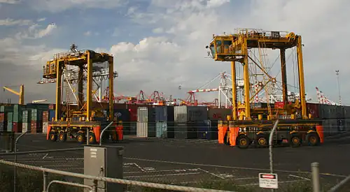 Straddle carriers at work at the Port of Melbourne, Australia