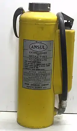 Ansul Met-L-X cartridge-operated dry powder fire extinguisher for class D fires, 1950s