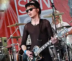 Larkin performing with Hole in 2010.