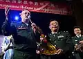 A Chinese military official with the Director of the Band of WMD, Colonel Sergei Vovk.