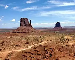 Two distinctive geological features found within the Monument Valley Navajo Tribal Park in northeast Navajo County, Arizona near Monument Valley, Utah