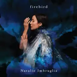 Album cover for "Firebird" by Natalie Imbruglia - a colorful illustration showing the side profile of the singer on a black background.