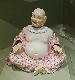Pagod, based on Asian figures of Budai, an example of Chinoiserie; by Johann Joachim Kändler; c.1765; hard paste porcelain; Metropolitan Museum of Art[166]