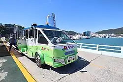 An optional paid train-like bus used to move passengers along the 768 meter bridge (2018)