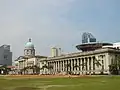 Old Supreme Court Building with the Padang, the New Supreme Court Building shown in the background.