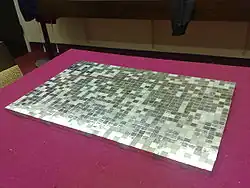 1,000 cubic centimeters of 99.9% pure platinum, worth about US$696,000 at 29 Jun 2016 prices[89]