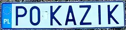 A rectangular plate reading P0KAZIK