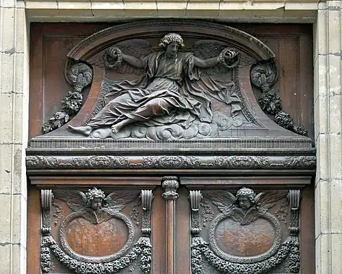 Carvings over the portal on Rue des Bernardins