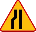 A-12c "road narrows — on the left"