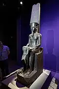 Statue of Amun; 1336-1327 BC; height: 220&nbsp;cm (87&nbsp;in), width: 44[clarification needed], length: 78&nbsp;cm (31&nbsp;in); Louvre
