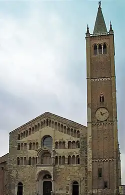 Parma Cathedral, Italy, 1178, has a screen façade ornamented with galleries. At the centre is an open porch surmounted by a ceremonial balcony. The tower, (Gothic 1284) is a separate structure as usual in Italy.