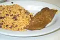 Puerto Rican arroz con gandules and pastel.