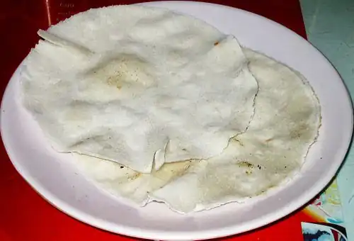 Pathiri, a pancake made of rice flour, is one of the common breakfast dishes among Mappilas