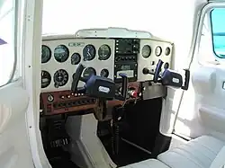 "W"/"U" style yoke in a Cessna 152 light aircraft, mounted on a horizontal tube protruding from the instrumental panel
