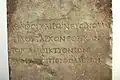Inscription in the votive stele of Plutarch.