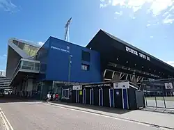 The West Stand with several turnstiles in front of it