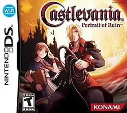 The front artwork of a square box. Two cartoon characters drawn in anime-style stand in the middle of the cover. The teenage girl on the left holds a large grimoire while the young adult male holds a coiled bullwhip. In the background is a large castle darkened by a large full moon behind it.