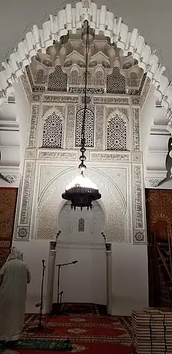 Lambrequin arches around the mihrab of the Qarawiyyin Mosque in Fes, from the Almoravid period (early 12th century)