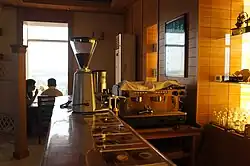 Coffee beans and an espresso machine at a coffee shop located next to the Pyongyang Hotel in Pyongyang, North Korea