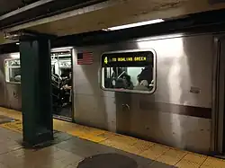 A 4 train made of R142 cars at the station, bound for Bowling Green