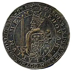 Coin from 1608, with a sword and a shield