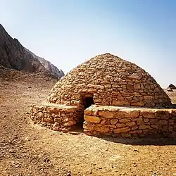 One of a small cluster of Hafit-period beehive tombs at the Mezyad[7][8] – Jebel Hafeet Desert Park[9] near Al Ain City in the Eastern Region of Abu Dhabi, which have been restored to show their original construction