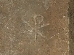 The Chi-Rho symbol ☧, Catacombs of San Callisto, Rome.