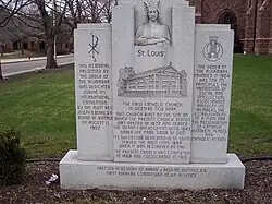Stone monument at Saint Louis Roman Catholic