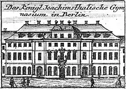 Black and white picture of a large school building