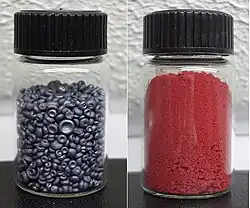 Image: 2 allotropes of selenium: black and red. 3 others not shown.