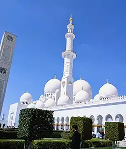 Outside of the Sheikh Zayed Grand Mosque (left)
