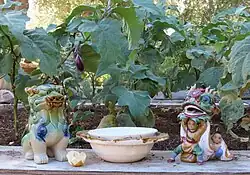 Shrine and eggplant in Chinese garden