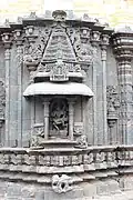 Shrine wall relief, molding frieze and miniature decorative tower in Mallikarjuna Temple at Kuruvatti