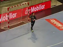 A picture of Sladana Dokovic during a game of handball.