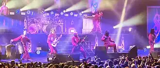 Several members of Slipknot performing onstage