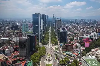 The Paseo de la Reforma is a wide avenue designed by Ferdinand von Rosenzweig in the 1860s and was modeled after the Champs-Élysées in Paris.[71] The avenue combines old and modern buildings.