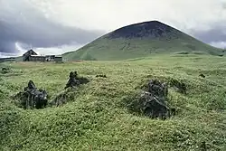 A green, gently sloping sopka in Kamchatka